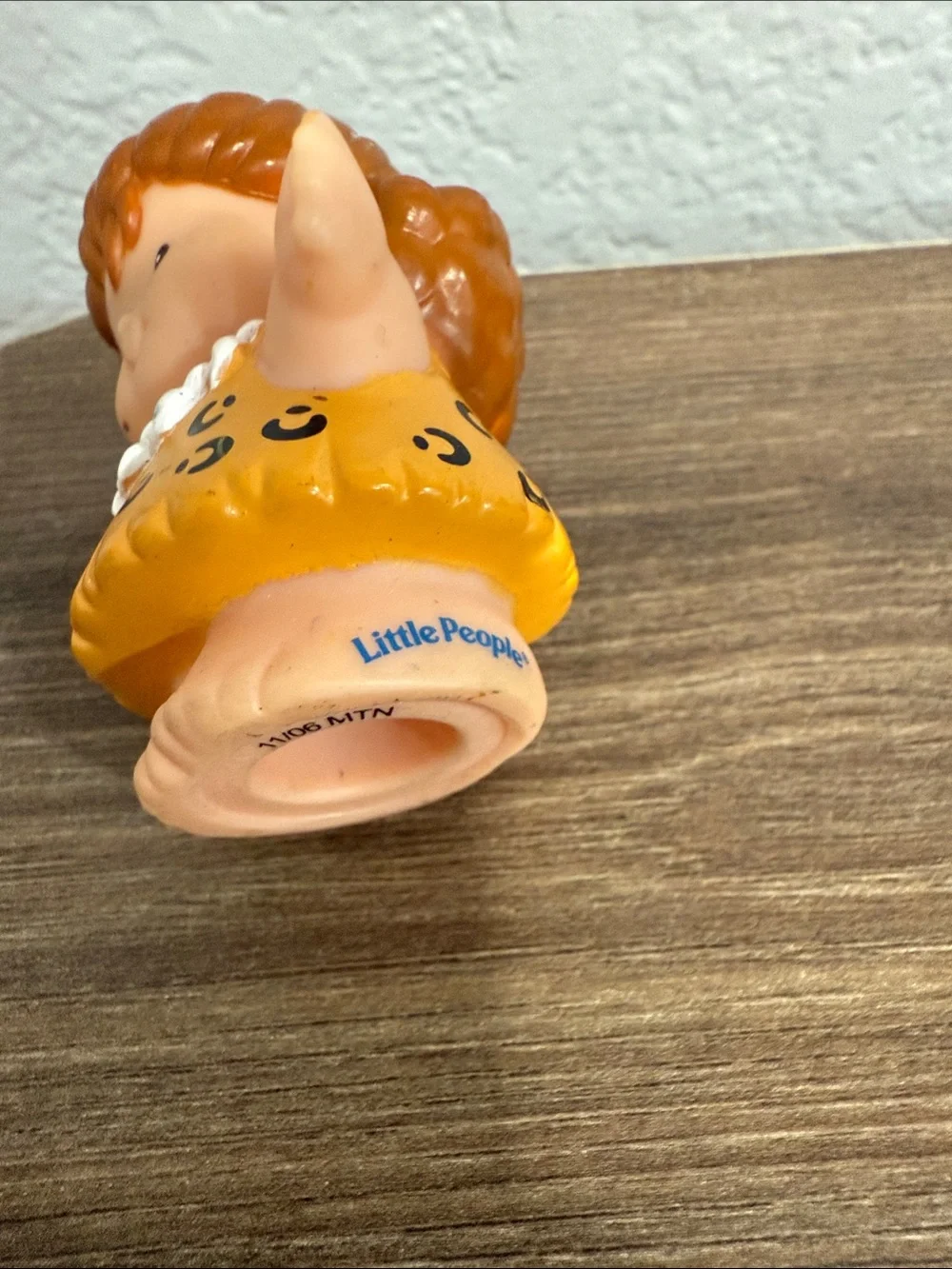 Fisher-Price Little People Cave Woman figure from the Dino Dinoland playset